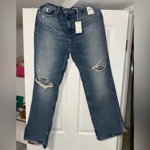 Good American Distressed Flare Jeans in Medium Blue